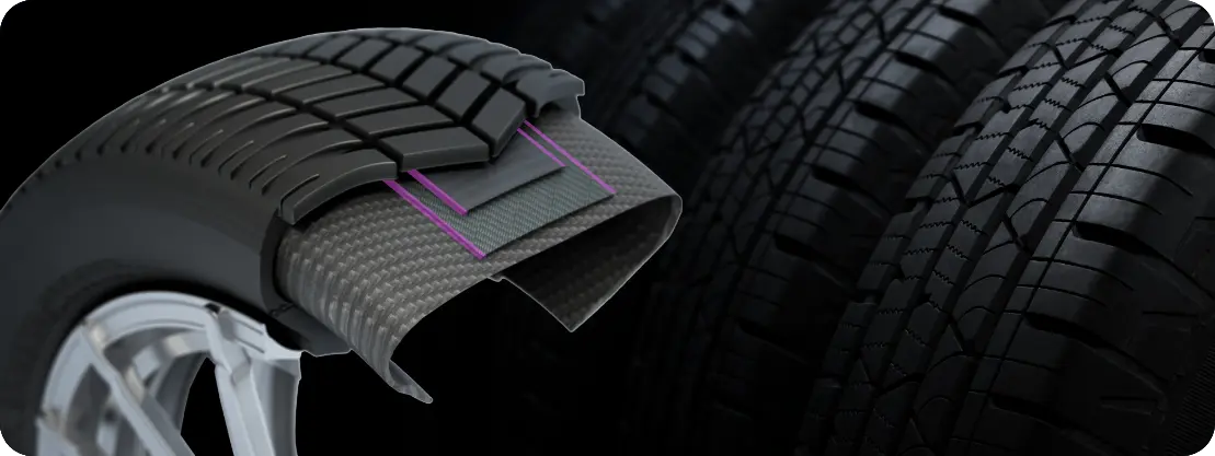A steel belt tire that uses Steelastic’s gum edging system to prevent friction.