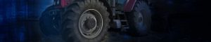 Steelastic Off-the-Road tires on a red tractor.
